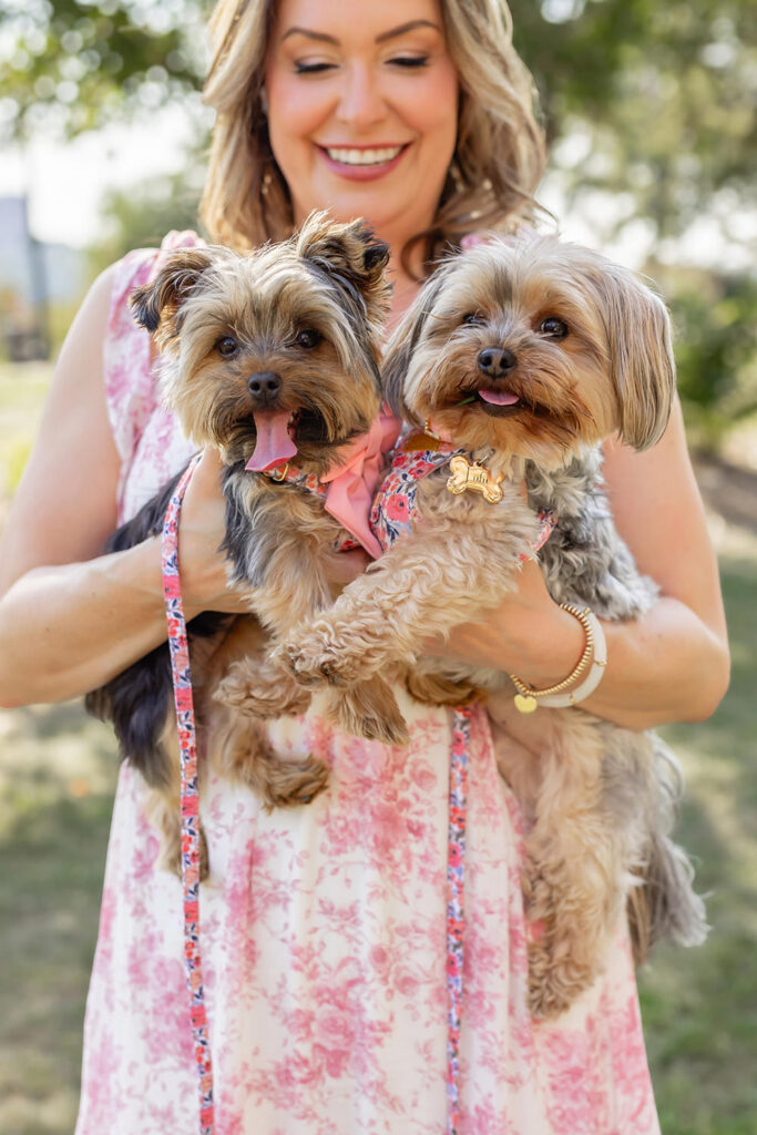 Personal brand photo featuring a business owner with her two dogs